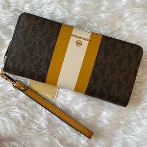 Brand New Michael Kors Center Stripe Marigold Large Zip Around Travel Wallet